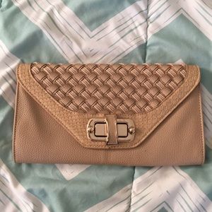 Tan clutch with gold chain